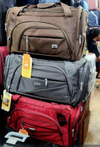 Travel duffel bags brown grey red on white background