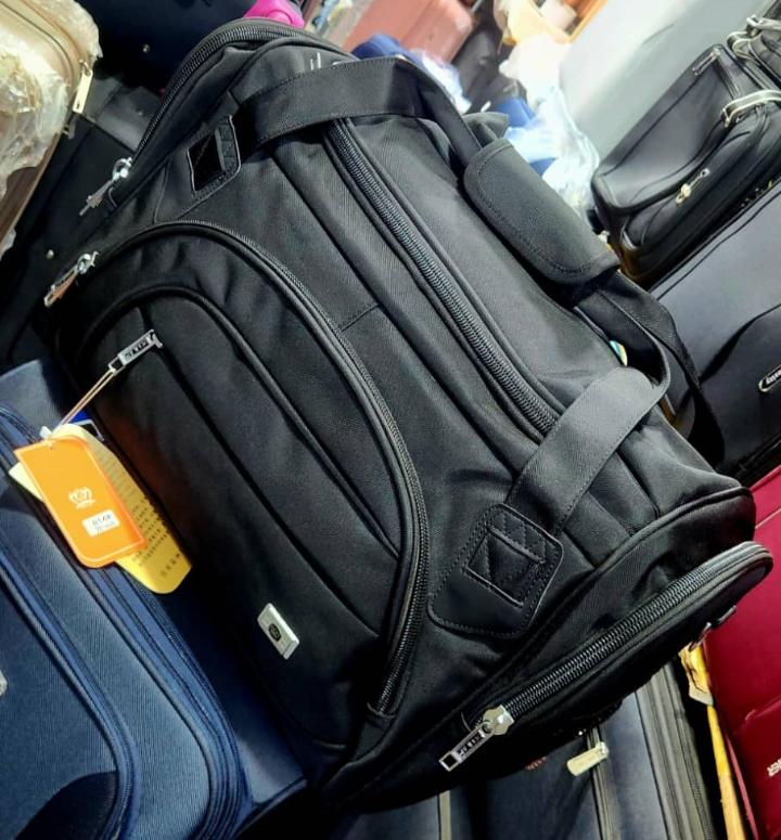 Black travel duffel backpack bag
