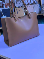 Women's Knot Handle Leather Tote Bag - Nude Beige angled view