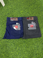 Two V9 Star Jeans in navy blue and charcoal black folded