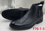 Original photo of black textured buckle ankle boots