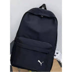 Black backpack with front pocket and white cat logo