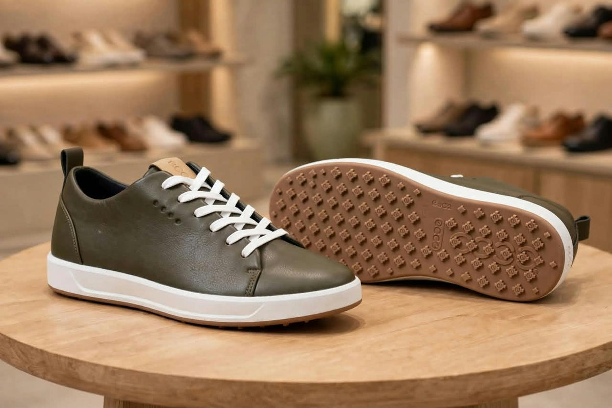 Original olive sneakers showing side profile and tan geometric outsole