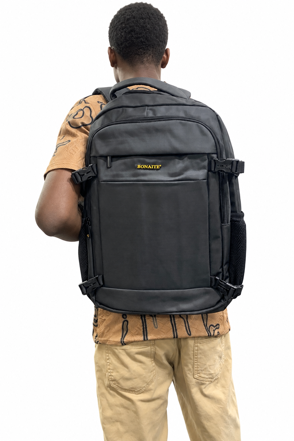 Backpack worn by model on white background