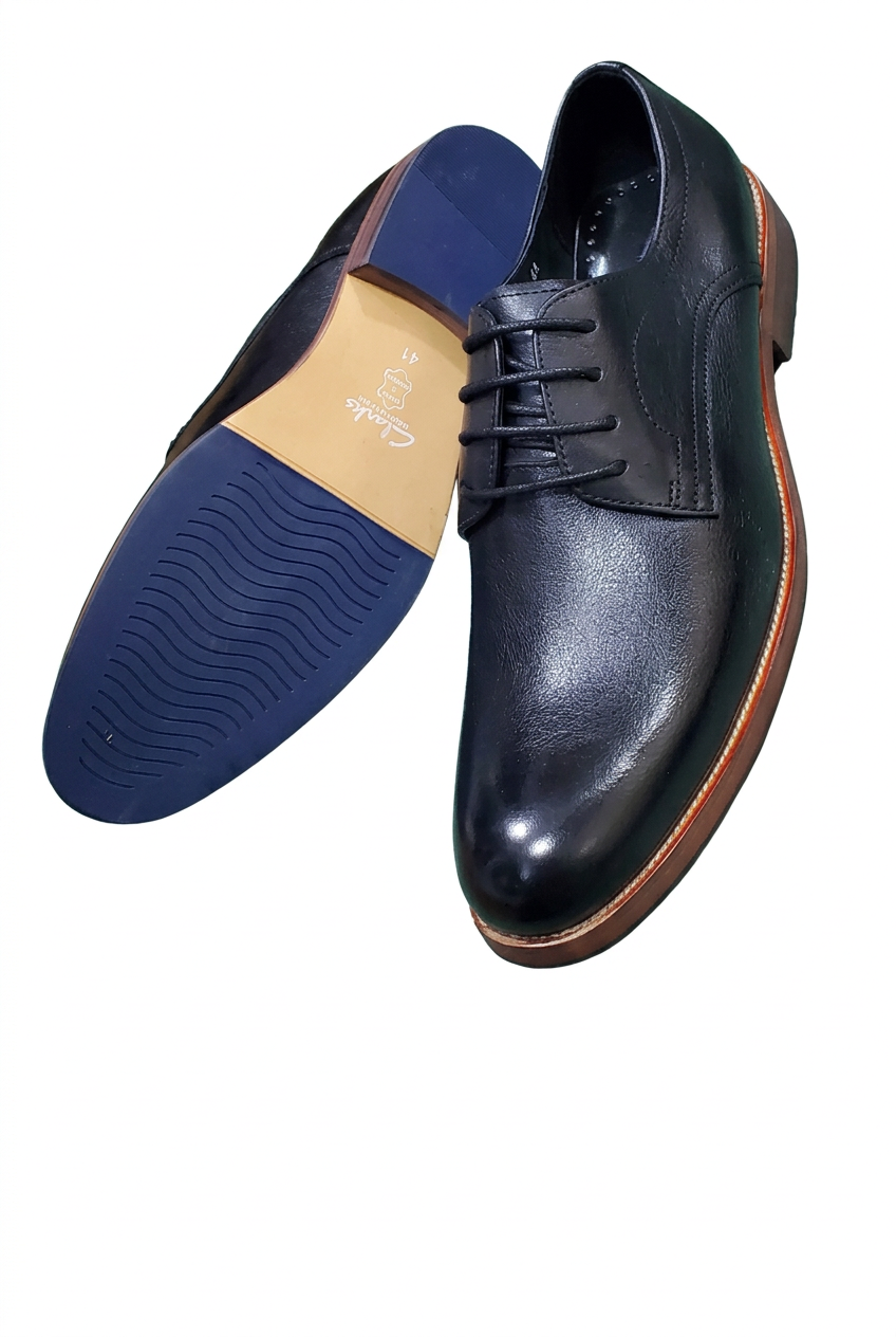 Black lace-up shoes with a white-background edit