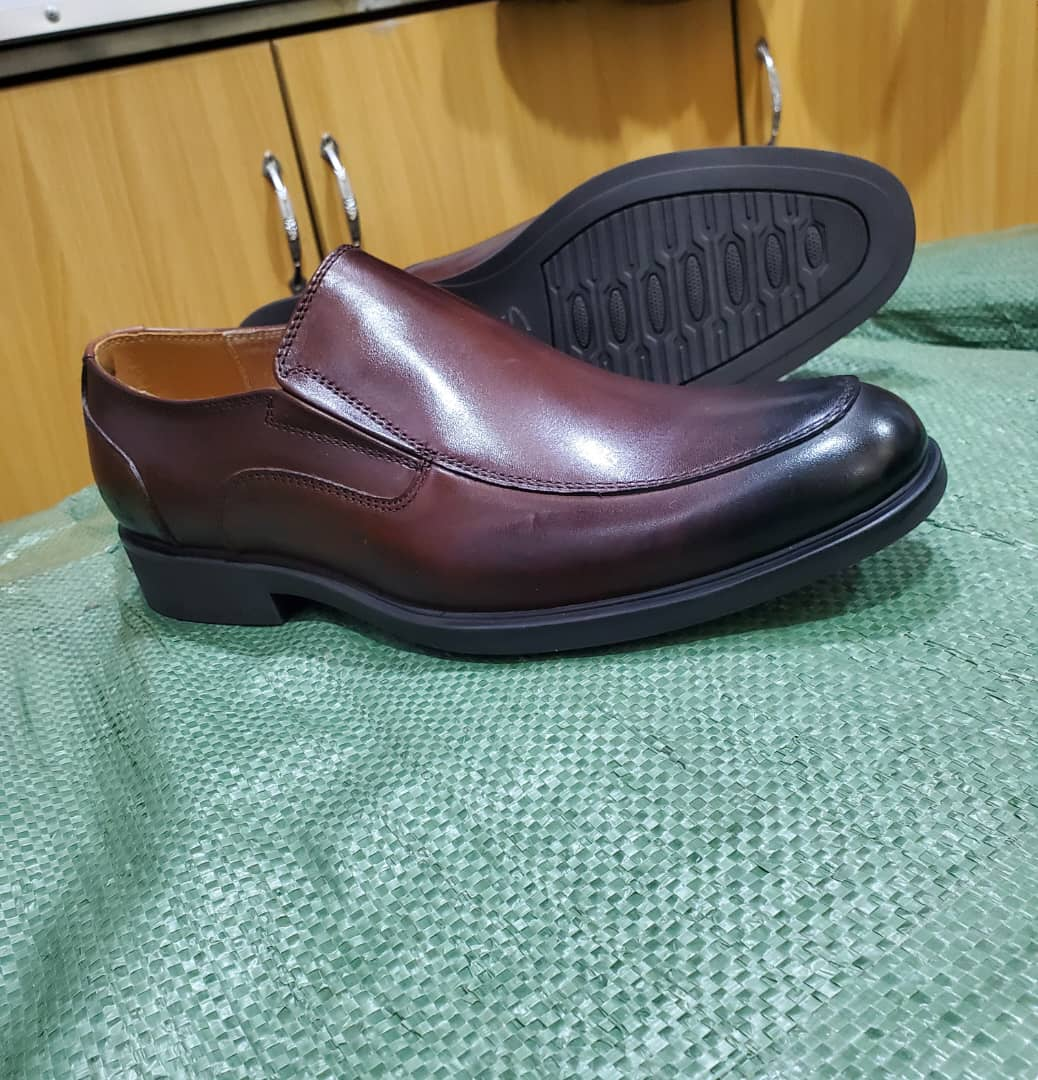 Original photo of burgundy slip-on gentle shoes