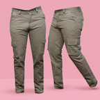 Taupe tactical cargo pants on a soft pink background