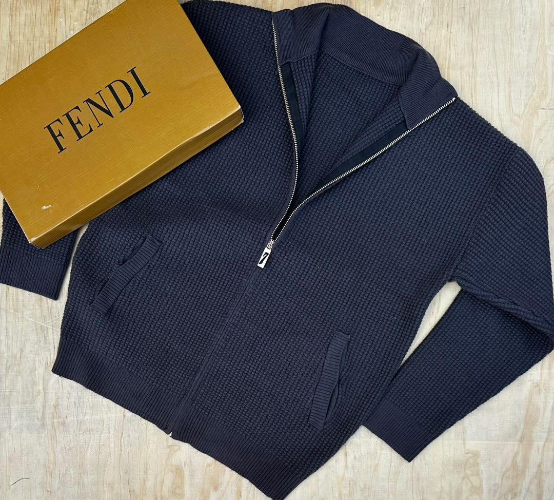 Original photo of navy textured zip-up knit sweater