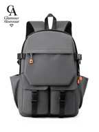 Original photo of grey dual buckle-pocket backpack with orange zipper pulls