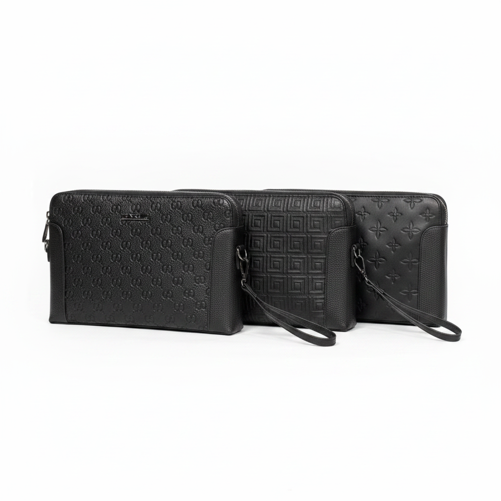 Three men's black embossed leather clutch bags on white background