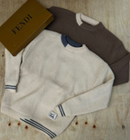 Original photo of cream and taupe crew-neck knit sweaters
