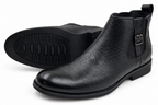 Black buckle ankle boots on a pure white background