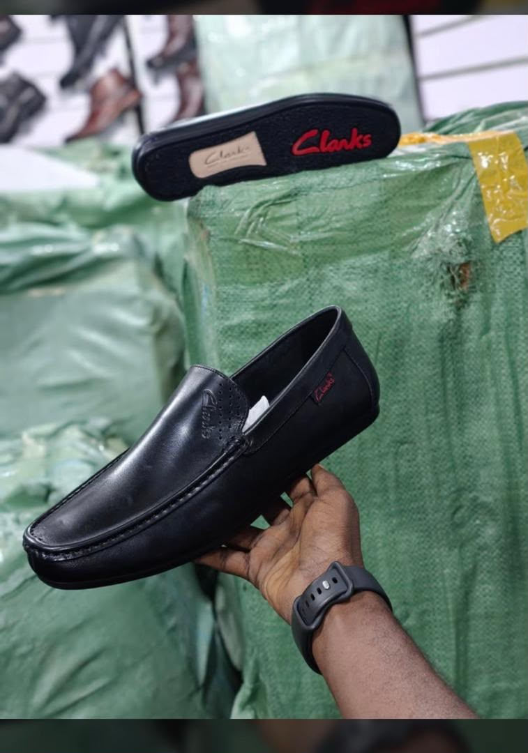 Original photo of smooth black slip-on loafers