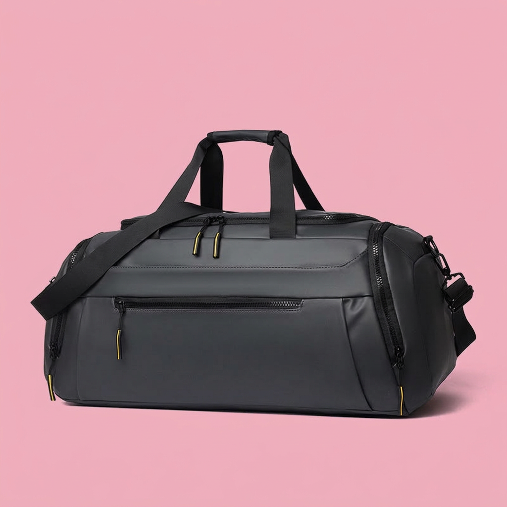Black duffle bag detail on soft pink background