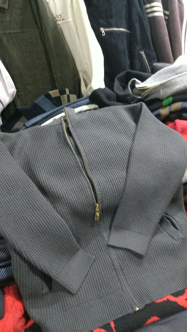 Original photo of grey textured zip-up knit sweater