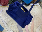 Waterproof Navy Blue Duffle Bag - front view with handles
