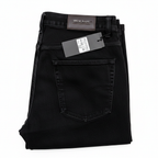 Men's black denim jeans folded white background