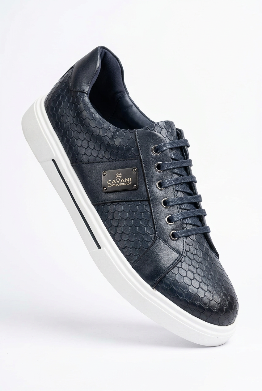 Single dark scale-texture sneaker on white background