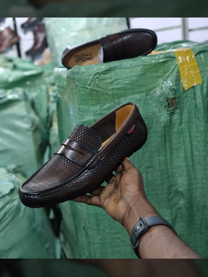 Original photo of brown woven-texture penny loafers