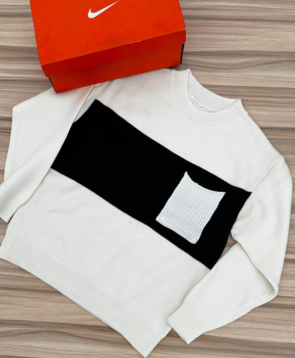 Original photo of white and black colour-block pocket sweater