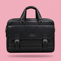 Black double-buckle briefcase bag on a soft pink background, square image