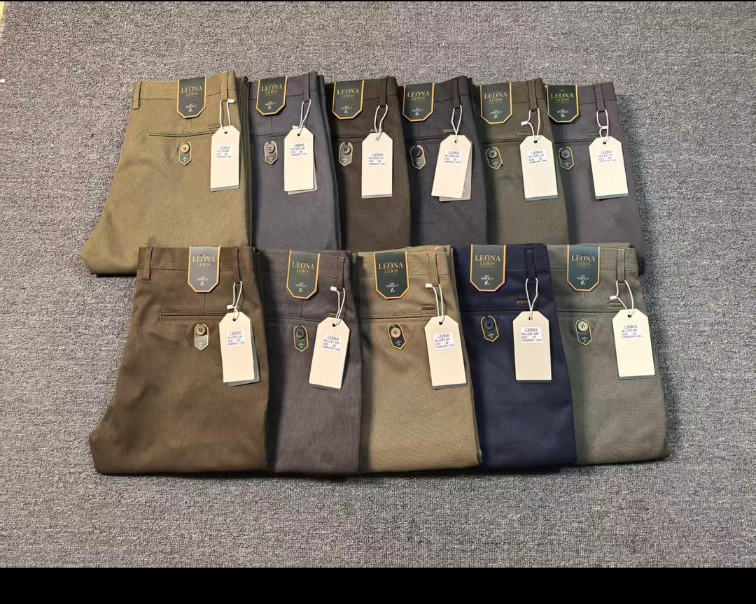 Assorted men's khaki pants in neutral colours, sold individually