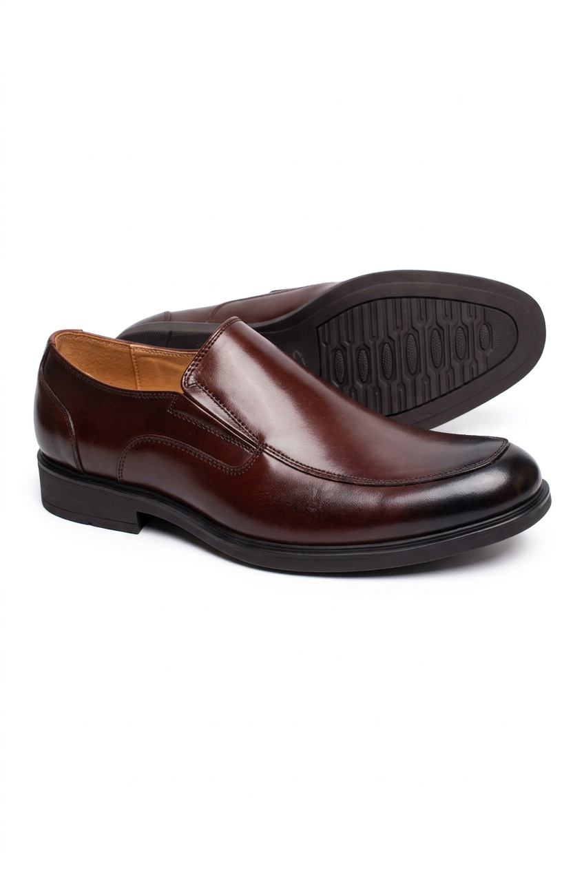 Burgundy slip-on gentle shoes on a white background