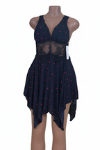 Navy blue polka dot dress on white background